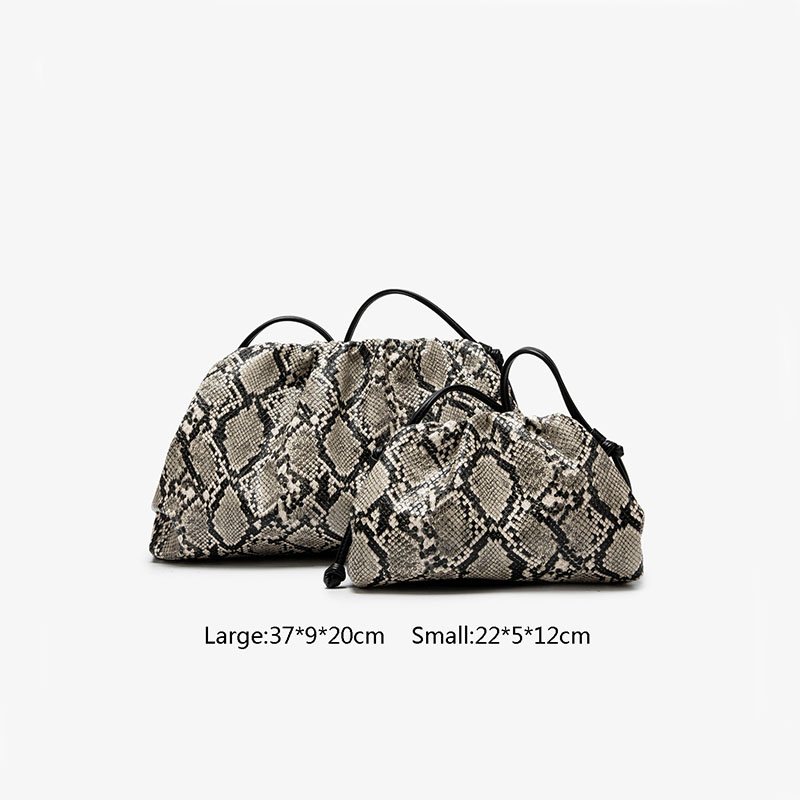 Ruched Serpentine Dumpling Bag - Luxury Bags Consignment recension och pris